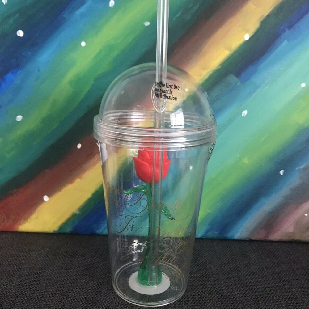 Beauty and the Beast magic rose travel cup. Screw-up dome lip